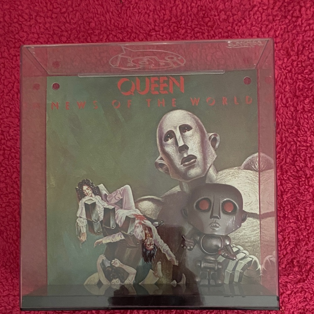 Funko Queen News of the World Display with Red and Green
